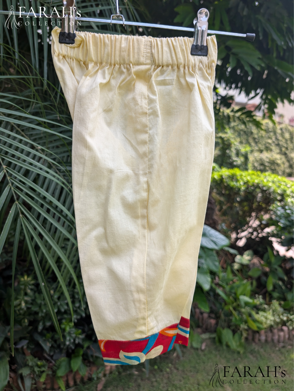 Ivory Sleeveless Kurti with Embroidered Placket & Printed Border Trouser (2-Piece Set)